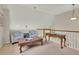 Cozy living room space featuring railing with vaulted ceiling at 4822 Pathfinder Ct, Castle Rock, CO 80108