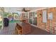 Outdoor patio with wood floors, seating and a grill at 5081 S Emporia St, Greenwood Village, CO 80111