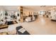 Bright and airy living space featuring open layout, modern finishes, and a seamless flow for versatile living at 6585 E Nevada Pl, Denver, CO 80224