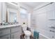Clean bathroom boasts granite countertop, modern fixtures, and a tub-shower combination for convenience at 13563 E 103Rd Pl, Commerce City, CO 80022