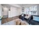Cozy living room featuring hardwood floors and neutral decor at 13563 E 103Rd Pl, Commerce City, CO 80022