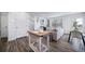 Open-concept living space with stylish design and easy access to the kitchen at 13563 E 103Rd Pl, Commerce City, CO 80022
