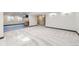 Spacious finished basement with neutral carpet, recessed lighting, and a convenient wet bar area at 518 Zircon Way, Superior, CO 80027