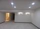 Finished basement with neutral carpet, recessed lighting, and potential for flexible use at 518 Zircon Way, Superior, CO 80027