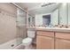 This bathroom features granite countertops, and a glass enclosed tile shower at 518 Zircon Way, Superior, CO 80027
