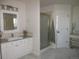 Bathroom featuring granite vanity, walk-in shower and ample space at 518 Zircon Way, Superior, CO 80027