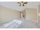 Spacious carpeted bedroom featuring a ceiling fan and great natural light at 518 Zircon Way, Superior, CO 80027