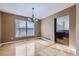 Bright dining room with hardwood floors and a window offering natural light at 518 Zircon Way, Superior, CO 80027
