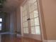 Elegant entryway featuring French doors, hardwood flooring, and views into an office at 518 Zircon Way, Superior, CO 80027