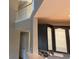 Kitchen featuring elegant cabinetry, granite countertops, and convenient access to the upper floor at 518 Zircon Way, Superior, CO 80027