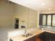 An open-concept kitchen features granite countertops, sleek cabinetry, and a convenient breakfast bar at 518 Zircon Way, Superior, CO 80027