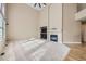 Spacious living room with high ceilings, a cozy fireplace, and a large TV area at 518 Zircon Way, Superior, CO 80027