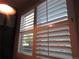 Window with open white shutters with an outside view from the kitchen at 518 Zircon Way, Superior, CO 80027