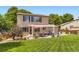 Expansive backyard featuring a patio area perfect for outdoor dining and entertaining at 9264 Fox Fire Ln, Highlands Ranch, CO 80129