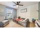 Charming bedroom with a playful decor, and a comfortable chair at 9264 Fox Fire Ln, Highlands Ranch, CO 80129