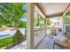 Inviting front porch featuring comfortable seating and a view of the street, perfect for relaxing at 9264 Fox Fire Ln, Highlands Ranch, CO 80129