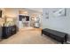 Open-concept living area showcasing hardwood floors, stylish decor, and seamless flow to the dining room at 9264 Fox Fire Ln, Highlands Ranch, CO 80129
