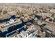 Aerial view of townhome community surrounded by trees and landscape at 3011 W 53Rd Ave, Denver, CO 80221
