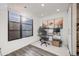 Bright home office with a large window, modern desk setup, and ample natural light at 3011 W 53Rd Ave, Denver, CO 80221