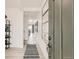 Bright entryway with stylish decor and modern accents, creating an inviting welcome at 16947 W 92Nd Dr, Arvada, CO 80007