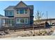 Beautiful two-story home with a backyard fence and landscaping at 16947 W 92Nd Dr, Arvada, CO 80007