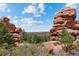 Scenic backyard with beautiful view of unique rock formations and Colorado landscape at 6619 Apache Pl, Larkspur, CO 80118