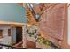Interior view featuring a staircase and a view of a natural rock formation within the house at 6619 Apache Pl, Larkspur, CO 80118