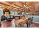 Bright living space featuring an open floor plan with kitchen, dining, and living areas at 6619 Apache Pl, Larkspur, CO 80118
