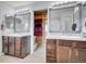 Primary bathroom boasting dual sinks, modern cabinets, and a large walk-in closet at 22898 E Ottawa Pl, Aurora, CO 80016