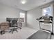 Versatile room with natural light, perfect for a home office and exercise space at 22898 E Ottawa Pl, Aurora, CO 80016