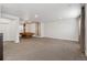 Spacious carpeted basement rec room with a pool table and modern design at 5876 Alton St, Denver, CO 80238