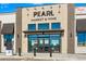 Front view of a Pearl Market & Wine establishment at 5876 Alton St, Denver, CO 80238