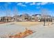 View of the neighborhood featuring single Gathering homes, trees, and green spaces at 5876 Alton St, Denver, CO 80238