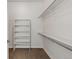 Walk-in closet featuring built-in shelving at 5876 Alton St, Denver, CO 80238