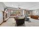 Finished basement with fireplace, pool table, and sitting area at 9535 S Shadow Hill Cir, Lone Tree, CO 80124
