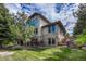 Stunning exterior with stone and siding accents at 9535 S Shadow Hill Cir, Lone Tree, CO 80124