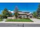 Two-story house with a landscaped yard and attached garage at 9535 S Shadow Hill Cir, Lone Tree, CO 80124