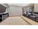 Home theater with recliner seating and media console at 9535 S Shadow Hill Cir, Lone Tree, CO 80124