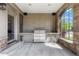 Outdoor kitchen with grill and stone countertops at 9535 S Shadow Hill Cir, Lone Tree, CO 80124