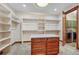 Large walk-in closet with ample shelving and drawers at 9535 S Shadow Hill Cir, Lone Tree, CO 80124