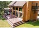 Spacious deck with patio furniture, ideal for enjoying the serene natural surroundings at 25257 Snyder Ave, Conifer, CO 80433