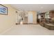 Spacious living room with access to the kitchen and hardwood floors at 9640 S Johnson St, Littleton, CO 80127
