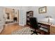 Inviting home office with desk, chair, and an open doorway at 9640 S Johnson St, Littleton, CO 80127