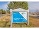 TrailMark Park sign with landscaping, street, and trees at 9640 S Johnson St, Littleton, CO 80127