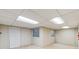 Unfinished basement with drop ceiling and windows that can be customized at 2891 W Long Dr # D, Littleton, CO 80120