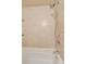 Bathroom with tiled shower and tub showcasing modern shower head and fixtures at 2891 W Long Dr # D, Littleton, CO 80120