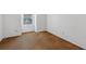 Spacious empty bedroom featuring carpeted floors and a window at 2891 W Long Dr # D, Littleton, CO 80120