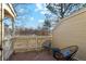 A charming patio with wicker chairs offering a peaceful outdoor retreat at 2891 W Long Dr # D, Littleton, CO 80120