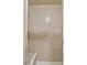 Close-up of a newly tiled shower with a built-in seat at 2891 W Long Dr # D, Littleton, CO 80120
