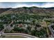 An aerial view that showcases the home's location nestled in a serene neighborhood with mountain views at 312 Allen St, Golden, CO 80401